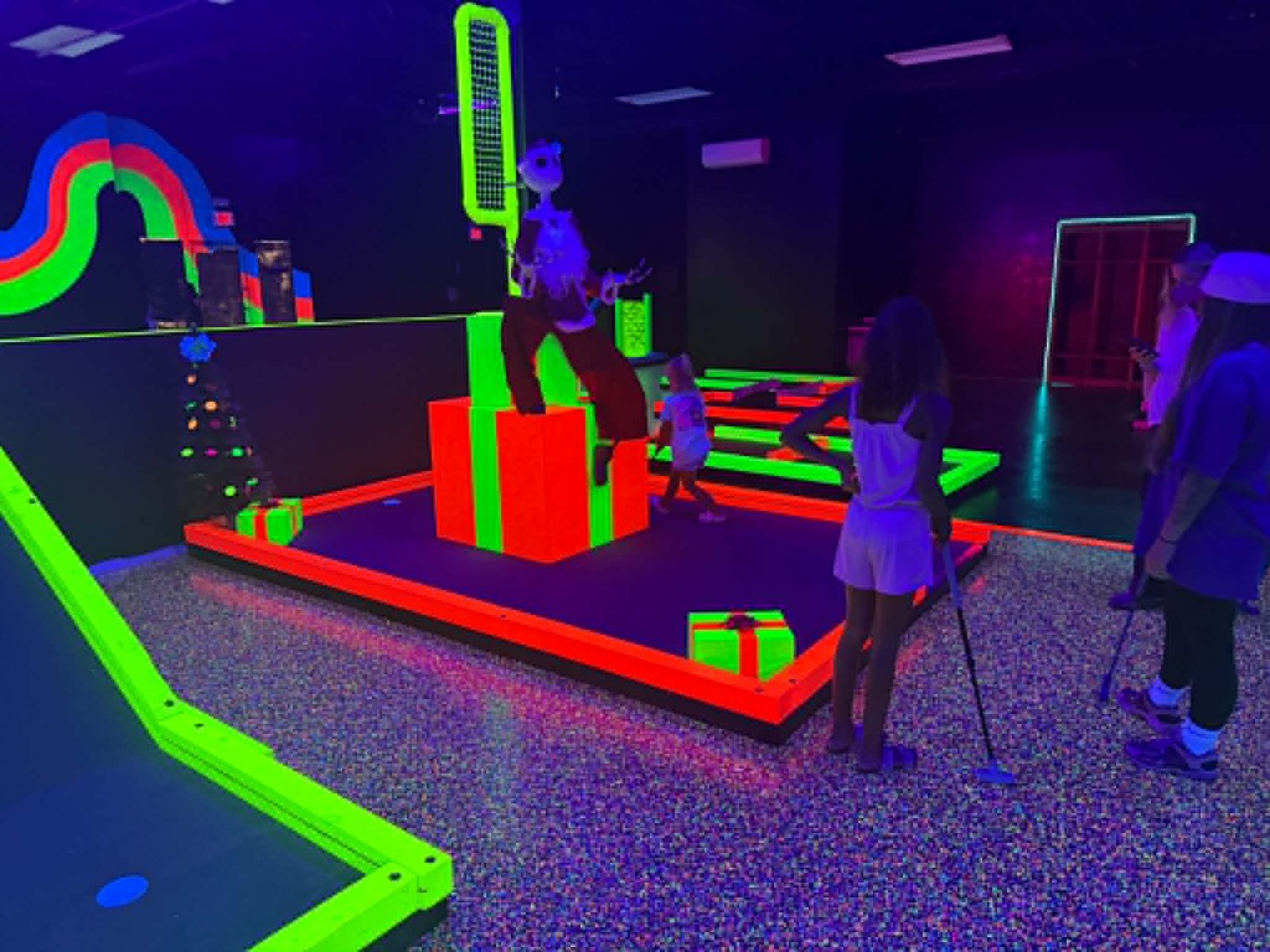 Christmas themed glow golf hole at Grand Slam Entertainment Branson