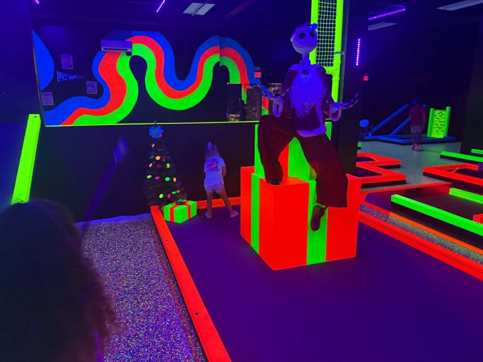 Neon Christmas themed mini golf obstacles in Branson MO